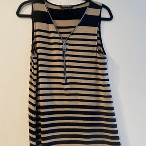 Cable and Gauge tank with zipper neckline and asymmetrical hem.  Size Large.